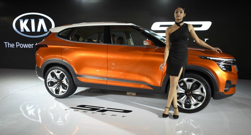 KIA PÅ TOPP: Kia stikker av med topplasseringen i Forbrukerrådets vurdering av norske bilgarantier. 31 merker var med i rangeringen. Her er det Kias splitter nye kompakt-SUV SP Concept som blir vist fram under bilmessen Auto Expo 2018 den 7. februar. Det kan se ut til at modellen på bildet ikke har fått med seg de gode nyhetene ... KIA PÅ TOPP: Kia stikker av med topplasseringen i Forbrukerrådets vurdering av norske bilgarantier. 31 merker var med i rangeringen. Her er det Kias splitter nye kompakt-SUV SP Concept som blir vist fram under bilmessen Auto Expo 2018 den 7. februar. Det kan se ut til at modellen på bildet ikke har fått med seg de gode nyhetene ...