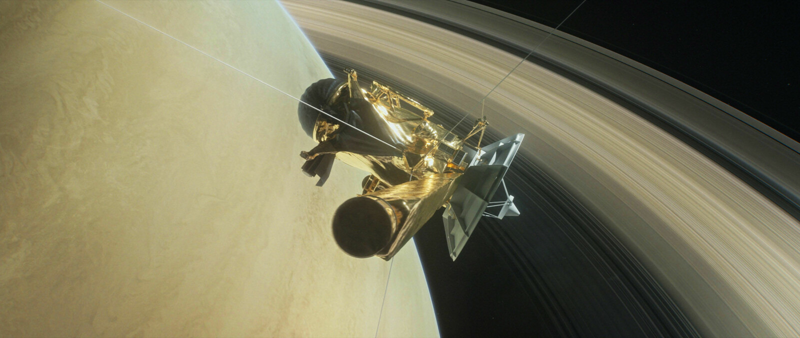 Illustrasjon av Cassini i det den dukker ned mellom Saturn og dens innerste ringer. Dette ble romsondens "Grand finale". Illustrasjon av Cassini i det den dukker ned mellom Saturn og dens innerste ringer. Dette ble romsondens "Grand finale".