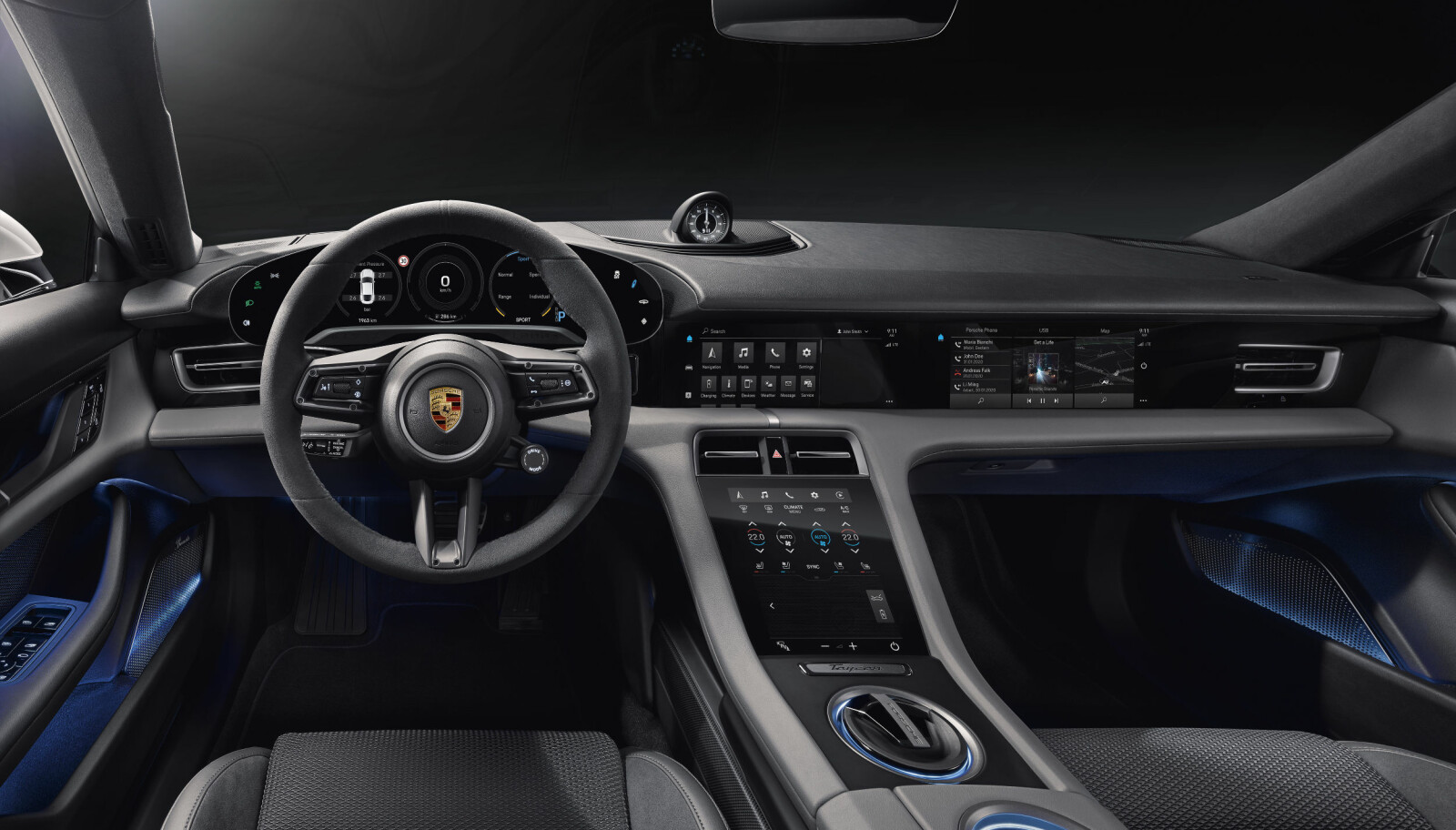 <b>TAYCAN: </b>Første offisielle bilde av interiøret i Porsche Taycan. Det skal være inspirert av første 911 fra 1963 og har mange likhetstrekk med interiøret i nye Porsche 911. Som 918 har ikke Taycan en tradisjonell girspak. Retningsvelgeren ligger sentralt på midtkonsollen og ser ut som en bryter. Instrumentet på toppen av dashbordet er en stoppeklokke for rundetider som følger med Sport Chrono-pakka. Det inkluderer også en Porsche Track Precision app. <b>TAYCAN: </b>Første offisielle bilde av interiøret i Porsche Taycan. Det skal være inspirert av første 911 fra 1963 og har mange likhetstrekk med interiøret i nye Porsche 911. Som 918 har ikke Taycan en tradisjonell girspak. Retningsvelgeren ligger sentralt på midtkonsollen og ser ut som en bryter. Instrumentet på toppen av dashbordet er en stoppeklokke for rundetider som følger med Sport Chrono-pakka. Det inkluderer også en Porsche Track Precision app.